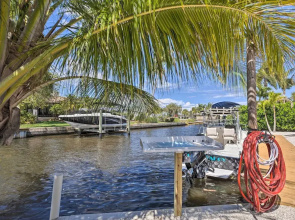Palm City Canalfront Home w/ Boat Dock & Fire Pit!
