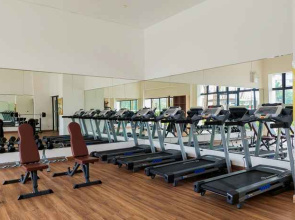 Minimalist and Comfy Studio at Sky House BSD Apartment By Travelio
