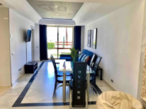 Frontline sea in the center of Puerto Banus.2bedrooms -Garden