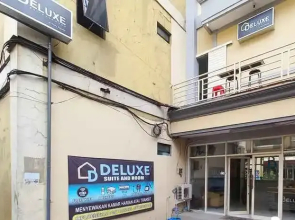 RedDoorz @Deluxe Hotel near Terminal Purabaya Bungurasih