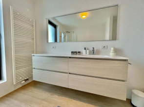 Modern 2BR 1.5 BA Near Diamond District by Oneluxstay