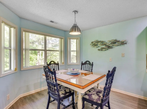 Southport Fall Getaway Condo w/ Deck + Pool