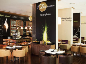 Отель Novotel Suites Mall Avenue Dubai