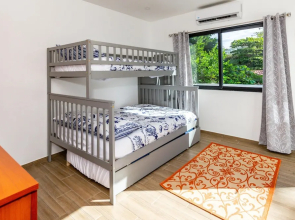 Ultramodern Townhome with an Inviting Coastal Design and Lush Outdoor Oasis with a Private Pool