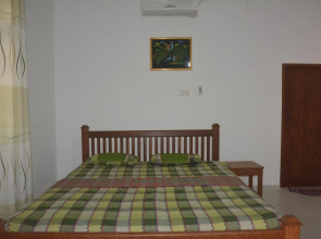Green White Deluxe Room
