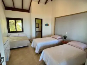 Casa Silveira a 400m da praia - condomínio fechado