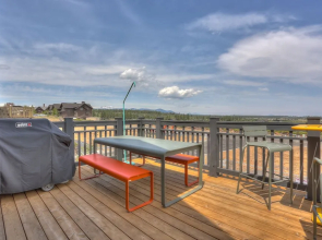 Pet-Friendly Cairn Home features Private Hot Tub and Fire Pit on the Back Patio by RedAwning