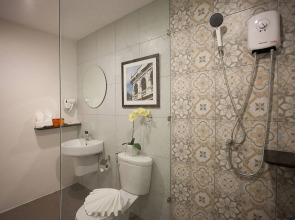 Отель Recenta Suite Phuket Suanluang