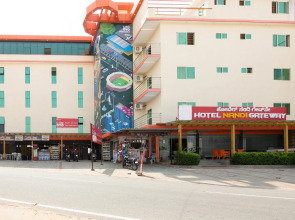 Capital O 15965 Hotel Nandi Gateway