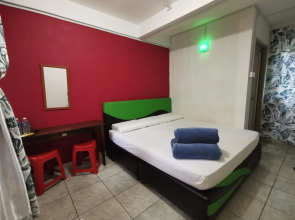 SPOT ON 89963 Sinurambi Homestay 2