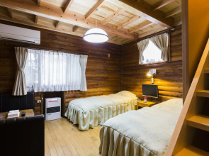 Cottage In Log Cabin