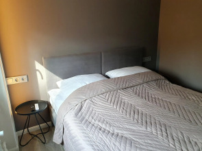 Апартаменты Три семерки на улице Гостиная