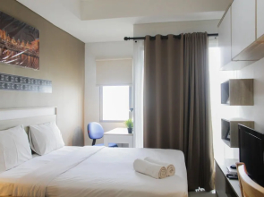 Bright Studio Apartment at Springwood Residence