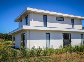 Magnificent waterfront design villa, located near Harderbos