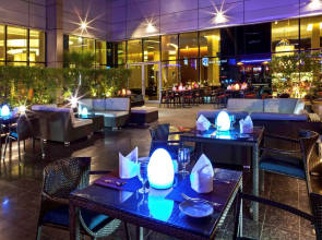 Отель Novotel Suites Mall Avenue Dubai