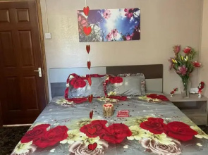 Riambel Paradise Inn Room with AC
