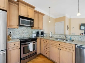 Kure Beach Villa - Enjoy Three Levels Of Luxury! Outdoor Pool And Garage Parking! 2 Bedroom Townhouse by RedAwning