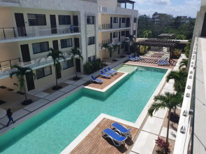 Blue Luxury 1 BD Apartment - Direct exit to the Pool - Fast WiFi - Free Parking