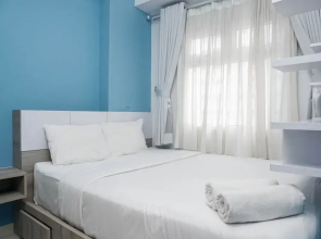 Relaxing and Warm 2BR @ Green Pramuka City Apartment