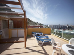 Golden Beach n. 12, Top Floor Apartment with Private Roof Terrace by El Sirocco