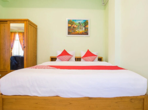 Rhona Guest House Syariah by OYO Rooms