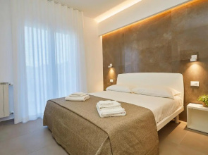 Porta del Golfo Apartments & Suites