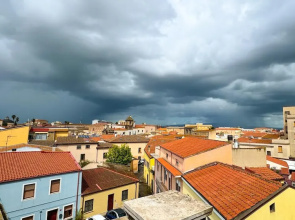 Sopra i Tetti Della Citt