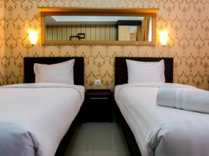 Minimalist and Comfy Studio The Oasis Cikarang Apartment By Travelio