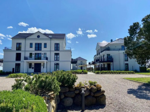 Fehmarn-Ostseeferien Strandresidenz Vogelflug141 App 4Meerblick