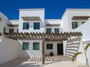 Piña Beach House in San Benito Beach