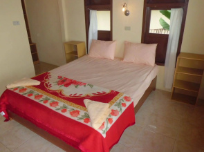 Tuk Tuk Timbul Bungalows