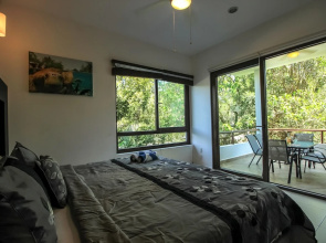 Condo with Pools Gym Yoga  by Olahola
