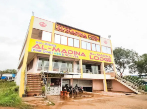 Al-Madina Fine Dine & Lodge by OYO Rooms