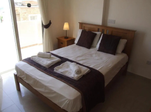 Top floor 2 bedroom apartment E101, 3 pools, sea view, FREE WIFI