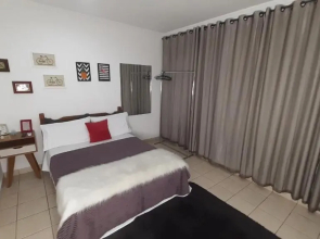 Suite climatizada, ao lado da praca principal