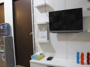 Minimalist 2BR The Suites Metro Apartment By Travelio