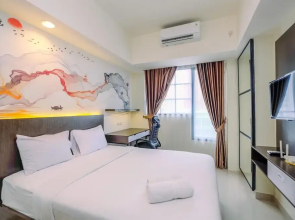 Cozy Stay and Tidy Studio at Evenciio Margonda Apartment