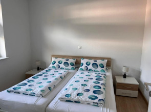 Ostfrieslands Perle Ferienwohnung an der Nordseeküste, Sauna, Terrasse, Garten, ruhige Lage, WLAN