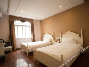 Xichang Qianyuhuakai Chinese Inn (Qionghai Wetland)