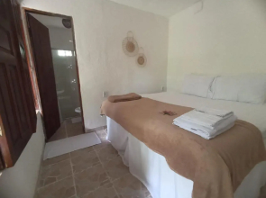 Canoa Hostel e Suites