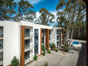 Designer apartment in a resort town in a residential complex with a swimming pool