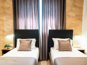 Ta  Guzeppi Boutique Stays by Zzzing