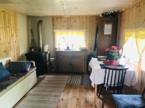 Tiny hut in the Forest Overlooking the River