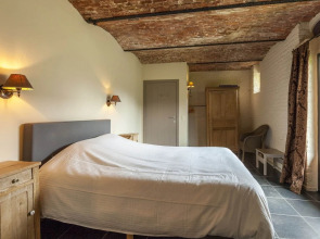 beautifull renovated farmhouse with traditional elements and a big garden