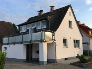 Ferienwohnung „Im Kleinen Löök“ - DG - 2 Zimmer - Balkon - Boxspringbett - 2 TV