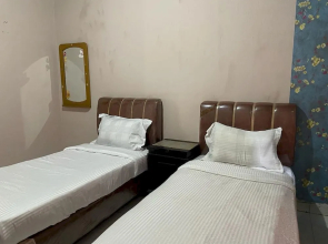 Hotel O Raudhatul Husna Homestay Syariah