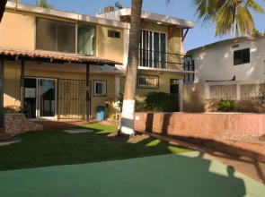 Casa Mister Ken pie de playa Los Cocos