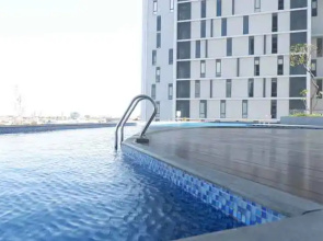 Premium 2BR at The Linden Apartment near Marvell City Mall By Travelio