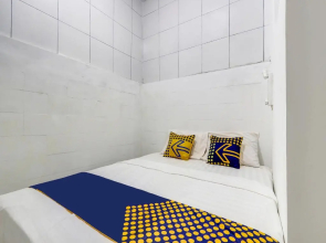 SPOT ON 90780 Gang Tengah Homestay