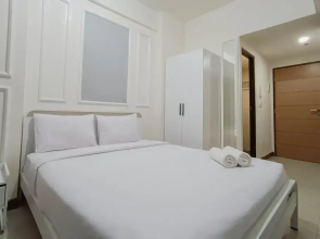 White And Cozy Studio At Vida View Makassar Apartment